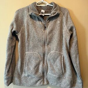 The North Face size M sweater zip up jacket. Two front slip pockets. Gray